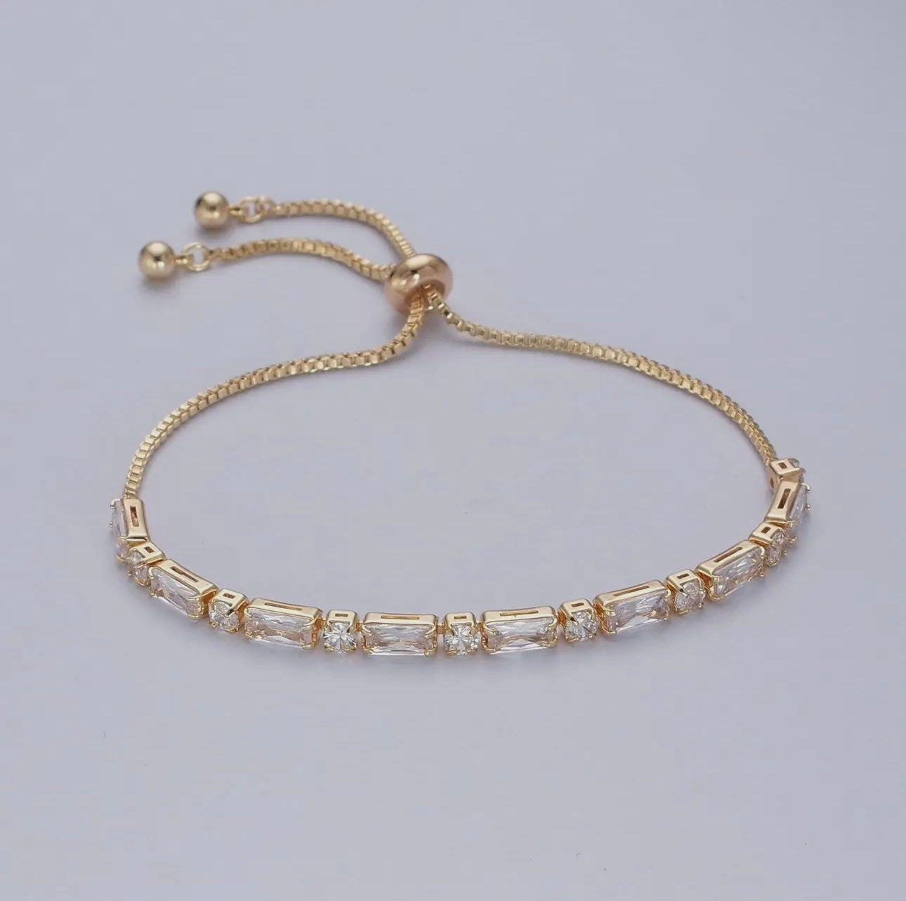 Angel baguette bracelet 24k gold