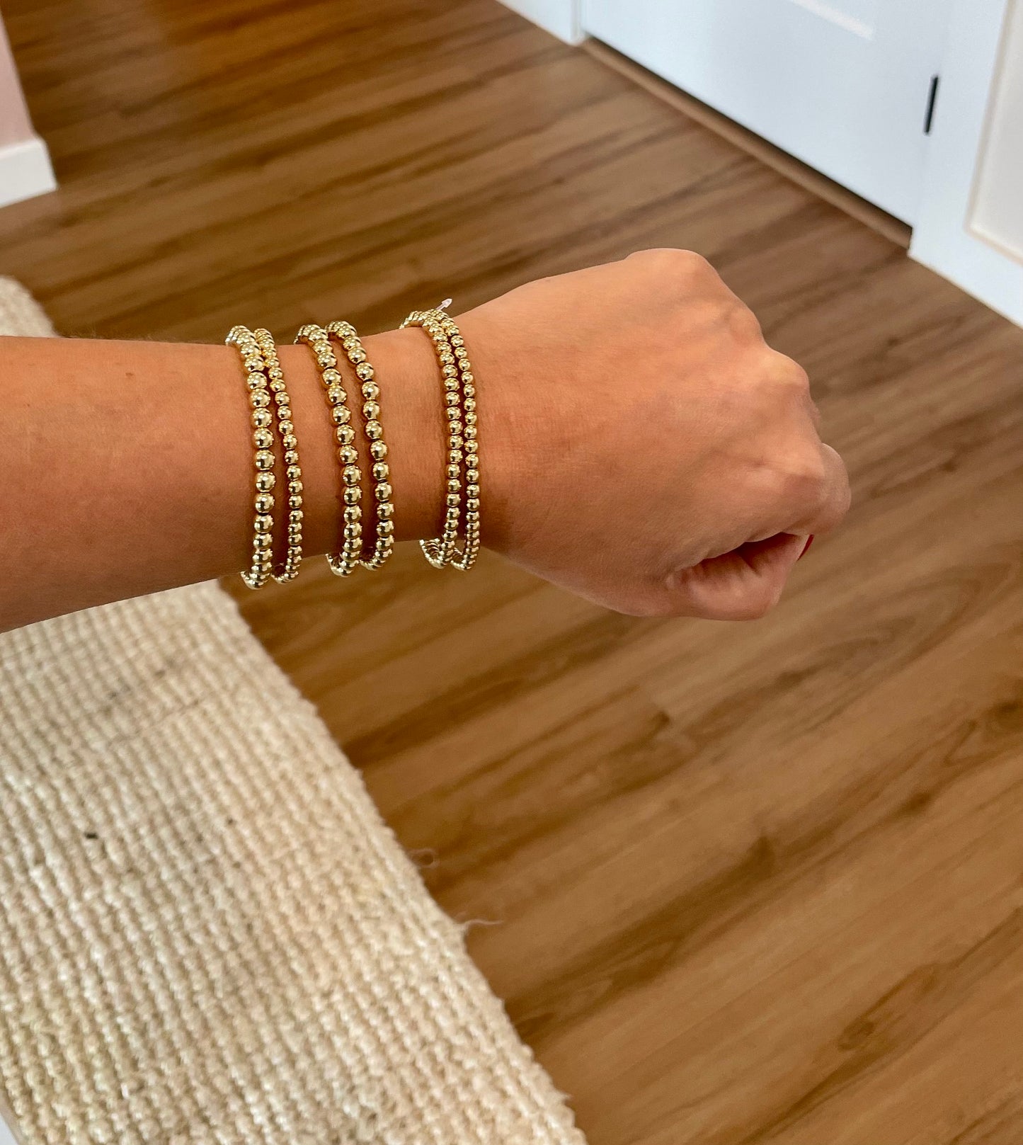 2 Gold Beaded Braclets